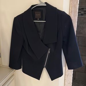 Limited asymmetrical zip up suit coat.